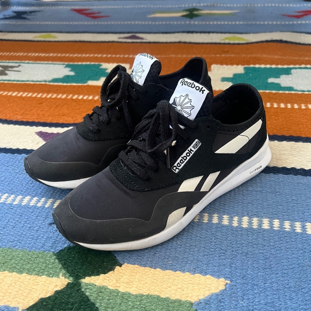 Reebok women’s Black and White Sneakers